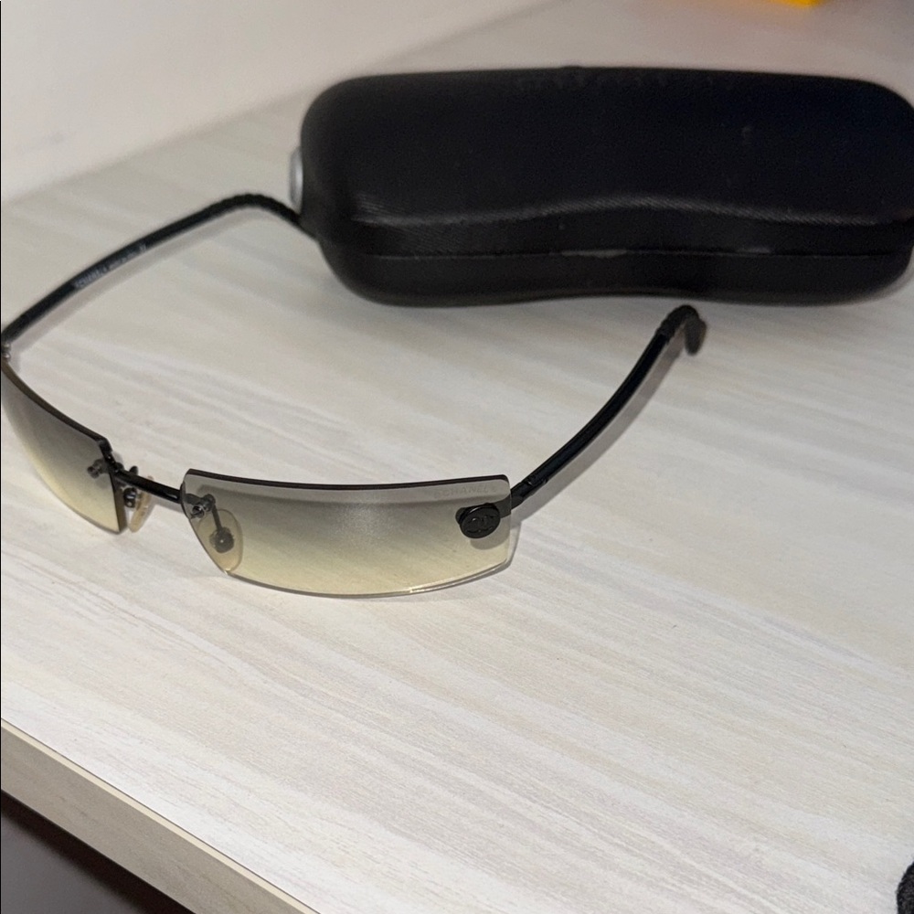 CHANEL Black Rimless Sunglasses with Gradient Lenses
